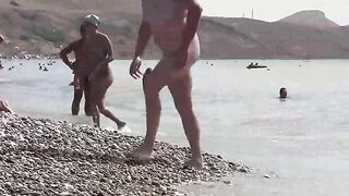 Nudists are having fun on the Crimean coast