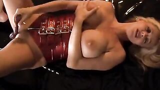 Busty MILF Rachel Aziani masturbates with a toy and reaches an intense climax
