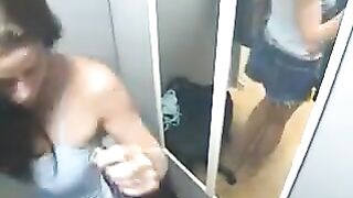 A naked girl is being filmed with a hidden camera