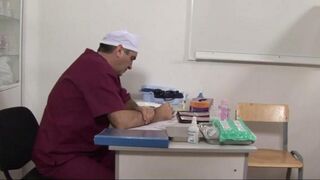 The doctor put a girl on a stretcher and stretched her pussy with an extender