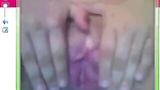 A pretty woman has sex just next to the camera in the chat