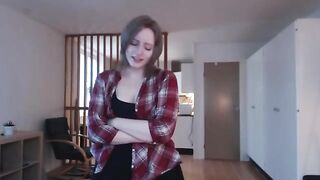 A cute girl plays with a big dildo, imitating sex with her boyfriend in a steamy solo scene