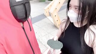 A hot Chinese girl plays a risqué version of the squid game