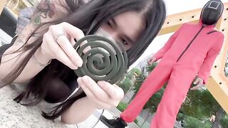A hot Chinese girl plays a risqué version of the squid game