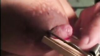A girl with big tits is being violently abused in a BDSM twist