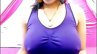 A girl is excited and her nipples protrude through the T-shirt