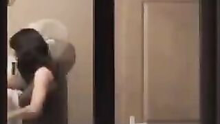 The guy admires himself in the mirror completely naked