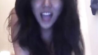 Hot Asian babe masturbates on her bed and shows you
