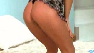 A young Russian debauchery shows striptease on a camera view