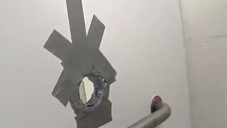 A girl is having fun in the toilet of a night club