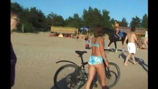 Beach tops - a girl has sex with her lover on the beach