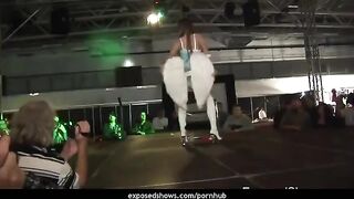 A hot brunette learns to work with a striptease pole