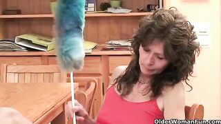 A mature woman plays with her pussy by herself