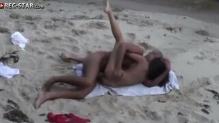 Real hidden camera shooting on the beach with a beautiful body girl