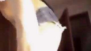 A beautiful Russian woman with big natural boobs gets naked