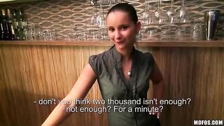 A beautiful girl is working as a bartender and she is doing it perfectly well