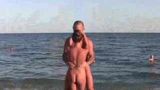 Nude acrobats have a great time on the beach