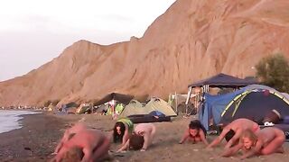 A volleyball game turns into a naked one on the beach