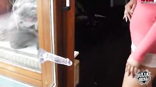 A hot girl plays with her big boobs and a dump truck