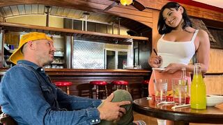 A girl is engaged in pleasant conversations, waiting for a cock