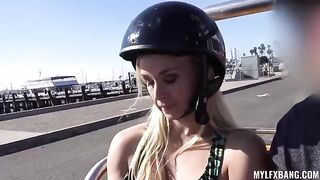 A pretty girl is having fun outdoors with a guy