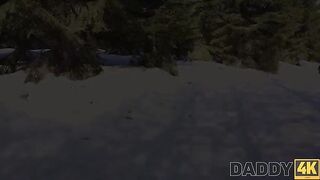 A hot girl is having fun on a sled by the fireplace
