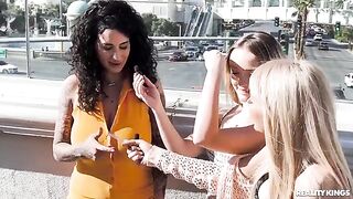 Girls in sexy outfits are having fun on the strip, showcasing their skills
