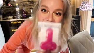 A girl is having fun with two guys in an apartment