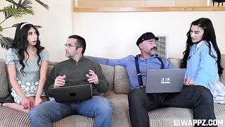 Two cute girls threw a party for their stepfather on the couch