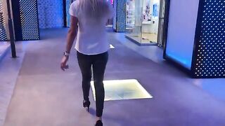 She’s ready to do anything for a sale in this hot mall scene