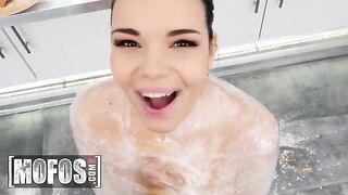 A hot slut with big tits helps the guy in the kitchen to cook