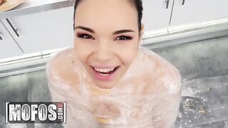 A hot slut with big tits helps the guy in the kitchen to cook