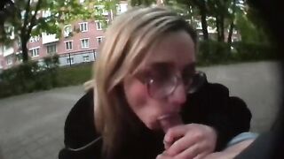A girl is sucking a cock right in the middle of the road