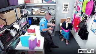 The beautiful blonde girl was inspected by a guard on the table