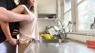 A couple has sex right in the kitchen, no need for a bedroom