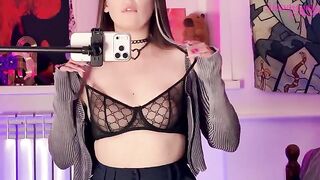 A girl caressed herself with a mirror, showcasing her allure