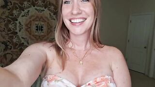 A busty brunette gives a sensual massage with shimmering oil, showcasing her skills in a steamy JOI session