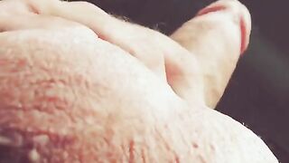The hand slides up and down the barrel with intense pleasure