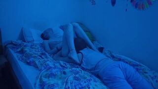 A couple enjoys intimate moments in the bedroom, dropping by drop