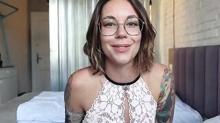An inked girl shows how to spread legs and masturbate without restrictions