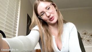 A girl with glasses, Emma Ruby, applies lipstick in a sensual POV style