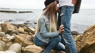 A sexy blonde girl makes blowjob on the city streets