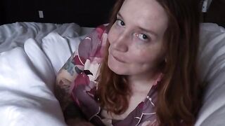 A woman is enjoying herself on a warm bed, inspiring others to do the same
